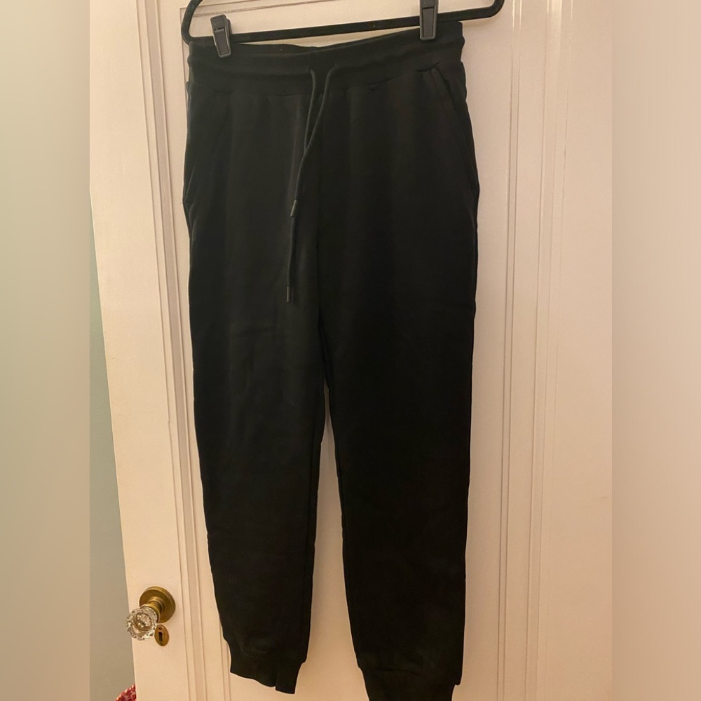 NWT and in packaging- fleo brand black joggers size medium